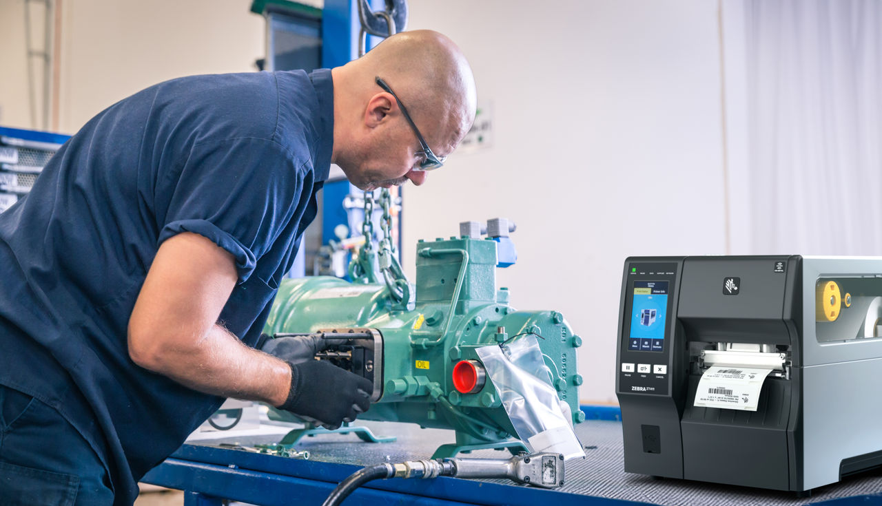 Machinist working while printing RFID labels simultaneously.
