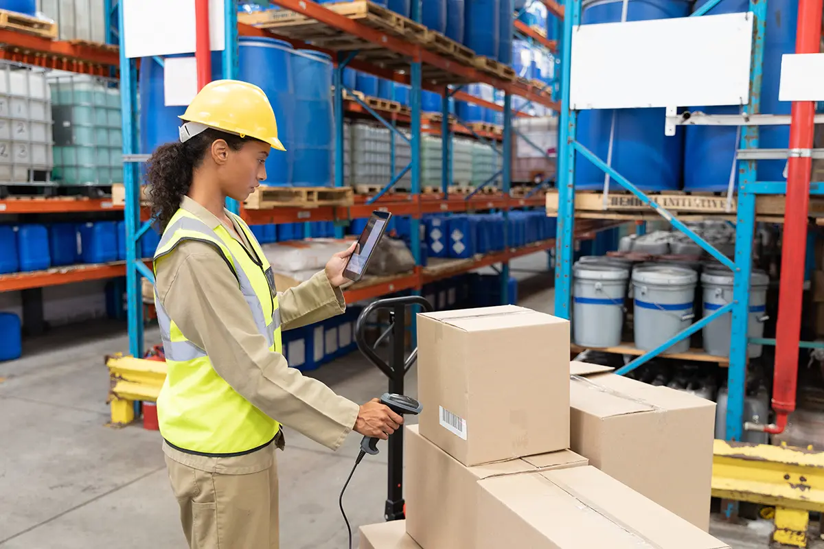 Barcode scanned by a worker in a warehouse setting
