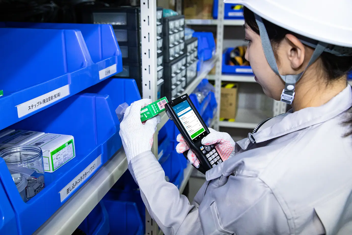 Worker scanning a barcode