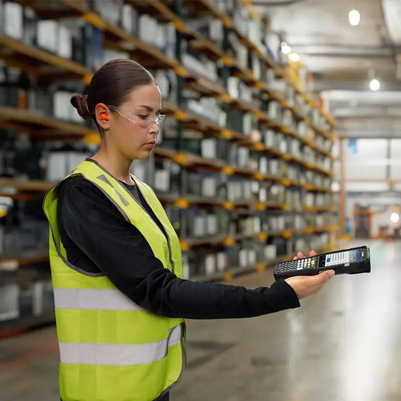 Warehouse worker using an RFID scanner