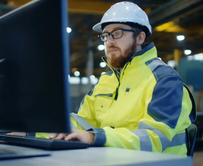 Warehouse worker updating labels for printing